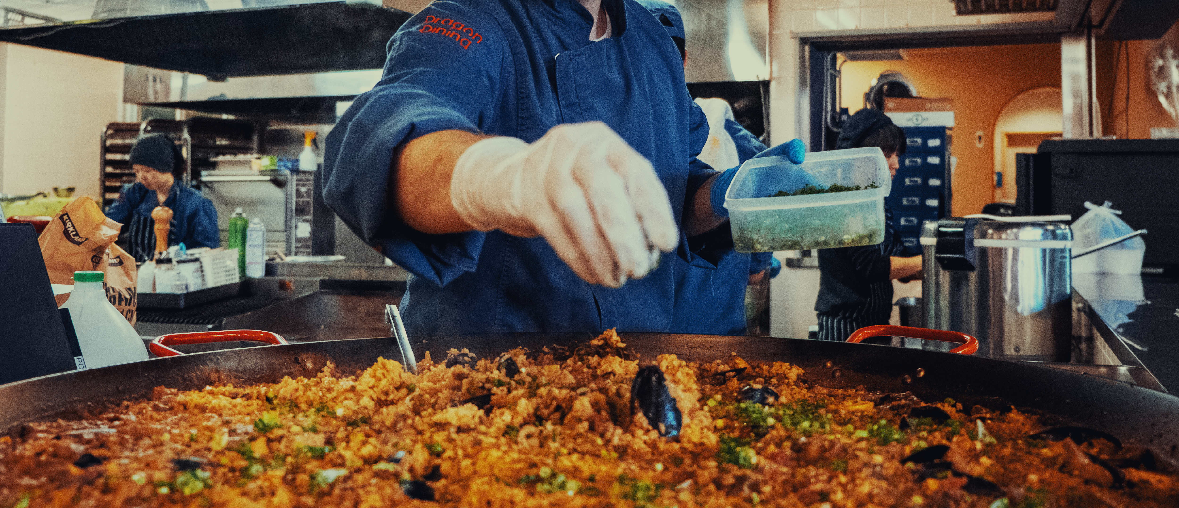 Professional kitchen in action at Dragon Dining